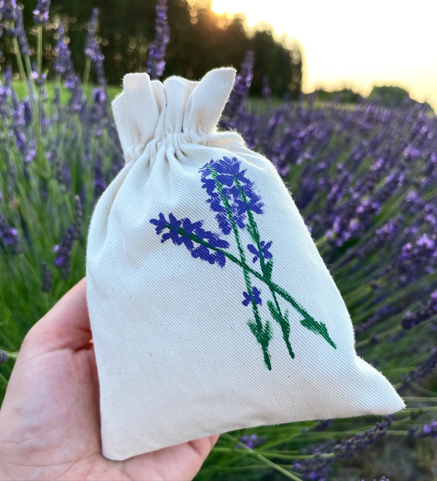 a man holding a purple catch in her hand
